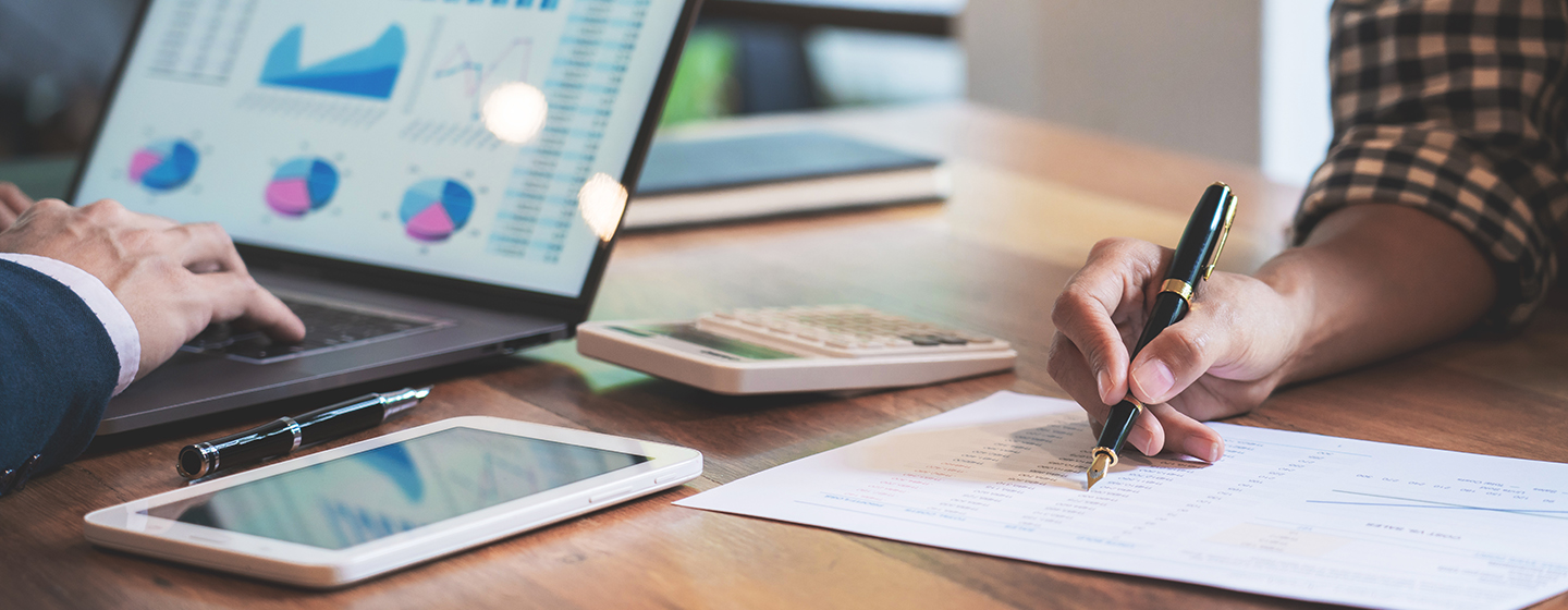 Market research and data analysis workspace with charts and business insights